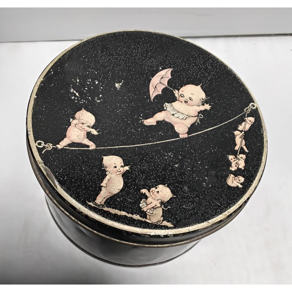 ANTIQUE ROSE O'NEILL KEWPIE TIN WALKING A TIGHTROPE EARLY 1900'S
